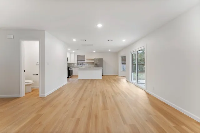 a view of kitchen with wooden floor