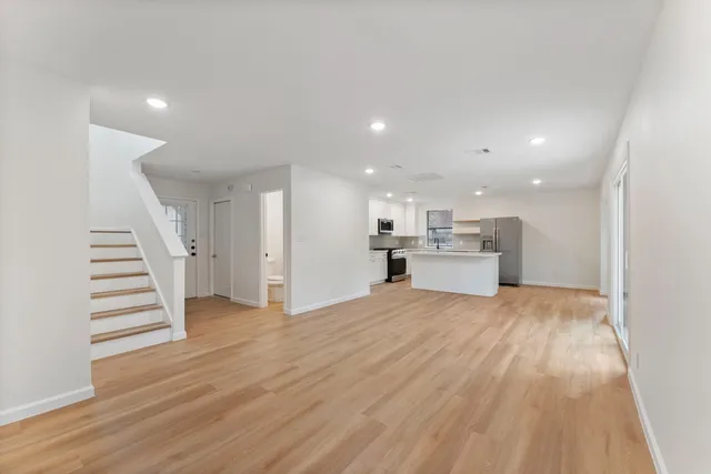 a view of kitchen with wooden floor
