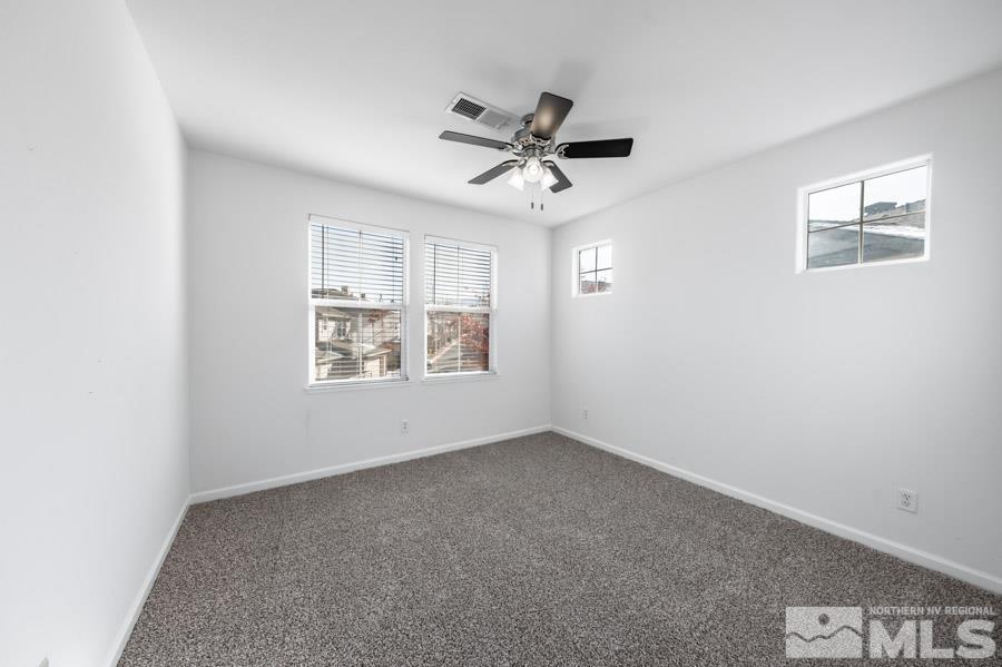 1680 Spicewood Circle Reno, NV 89523 - Photo 28 of 39 a view of an empty room with a window