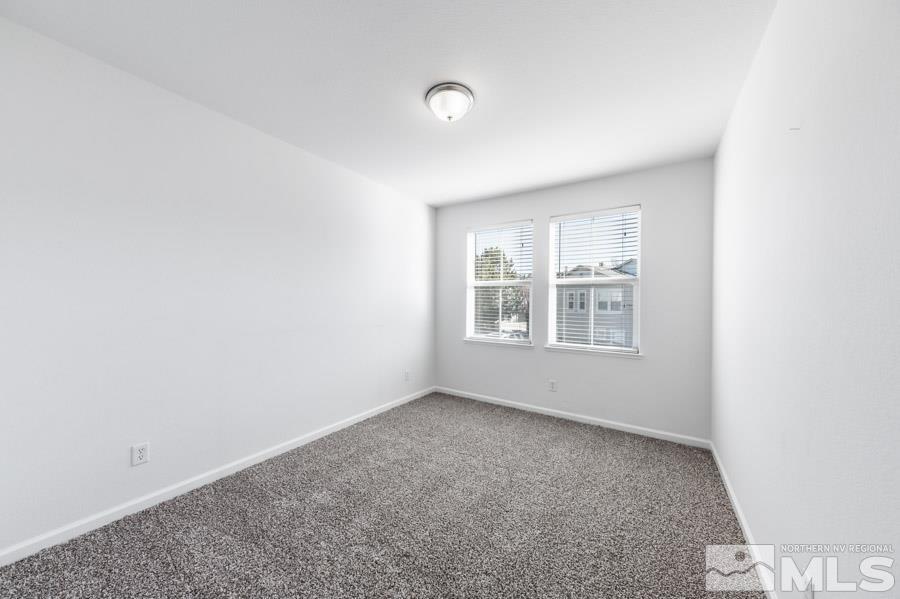 1680 Spicewood Circle Reno, NV 89523 - Photo 29 of 39 a view of an empty room with a window