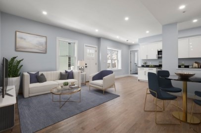 167 Charles Street, Unit 4 Waltham, MA 02453 - Photo 4 of 9 a living room with furniture wooden floor and a kitchen