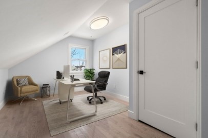 167 Charles Street, Unit 4 Waltham, MA 02453 - Photo 7 of 9 a work room with furniture and a window