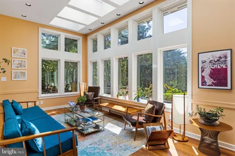 a kitchen with a stove a sink and a refrigerator