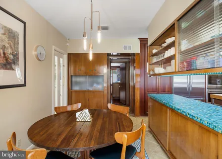 a bedroom with a large bed and a couch