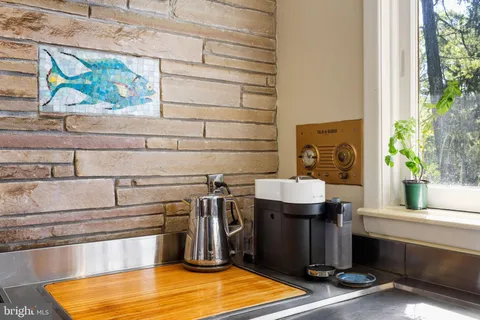 a bed room with a bed and a television