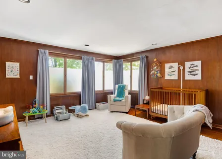 an aerial view of a house with a garden