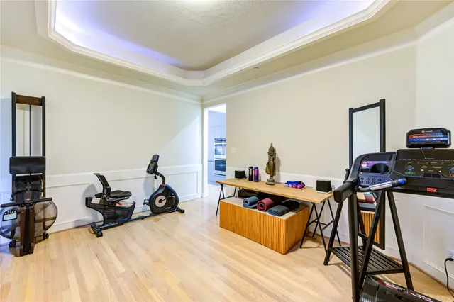 a room with furniture and a wooden floor