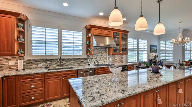 a kitchen with lots of counter space and a sink