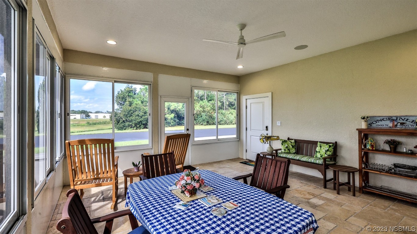 606 Midfield Loop Edgewater, FL 32132 - Photo 21 of 42 a living room with furniture and a window
