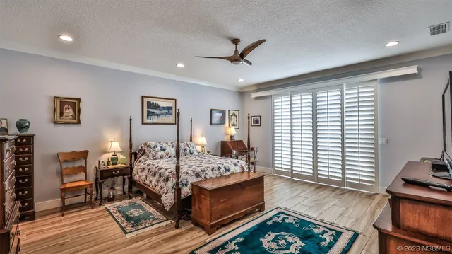 a bed room with furniture and a window