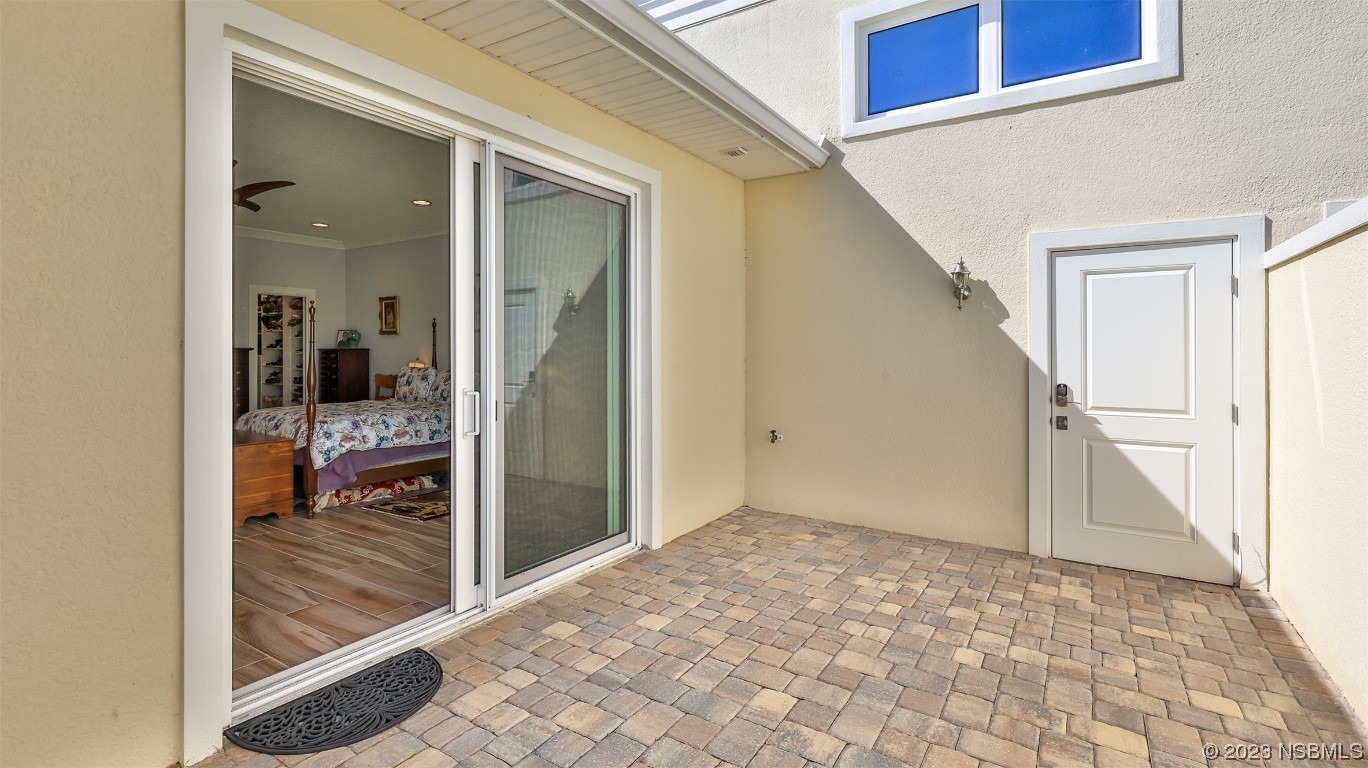 606 Midfield Loop Edgewater, FL 32132 - Photo 27 of 42 a view of a hallway view with wooden floor and staircase