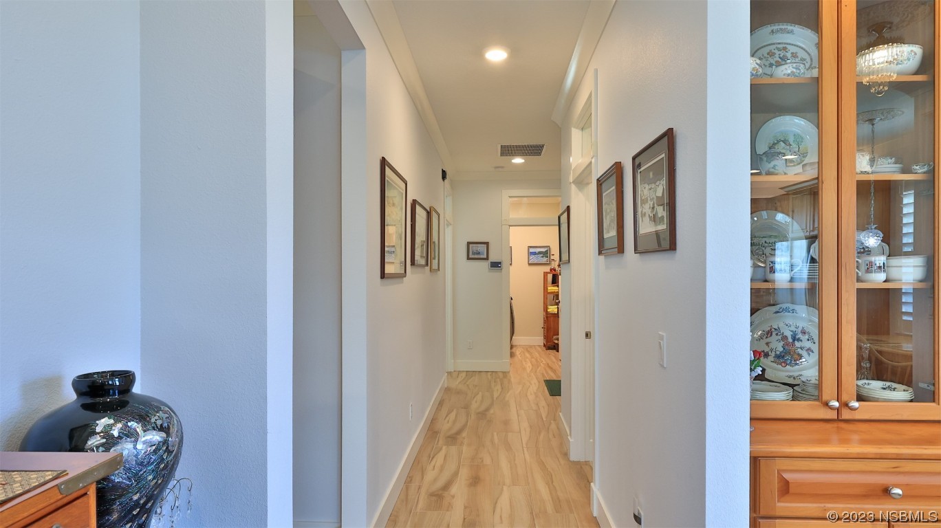 606 Midfield Loop Edgewater, FL 32132 - Photo 30 of 42 a view of a hallway with interior of the house