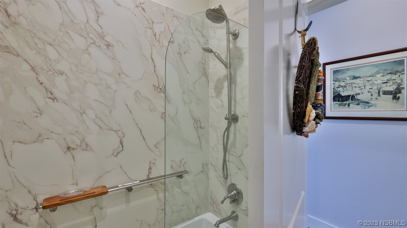 606 Midfield Loop Edgewater, FL 32132 - Photo 34 of 42 a bathroom with a shower