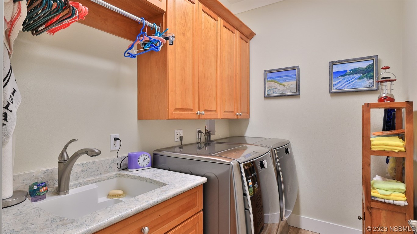 606 Midfield Loop Edgewater, FL 32132 - Photo 35 of 42 a bathroom with a sink and a mirror