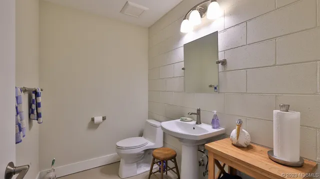 a bathroom with a sink and a toilet