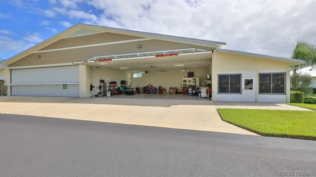a view of swimming pool with outdoor seating