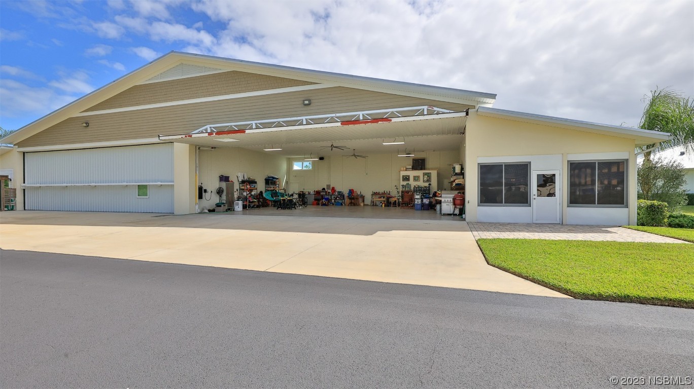 606 Midfield Loop Edgewater, FL 32132 - Photo 8 of 42 a view of swimming pool with outdoor seating