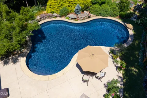 $975,000 | 212 Middlegreen Place, Holly Springs, NC 27540