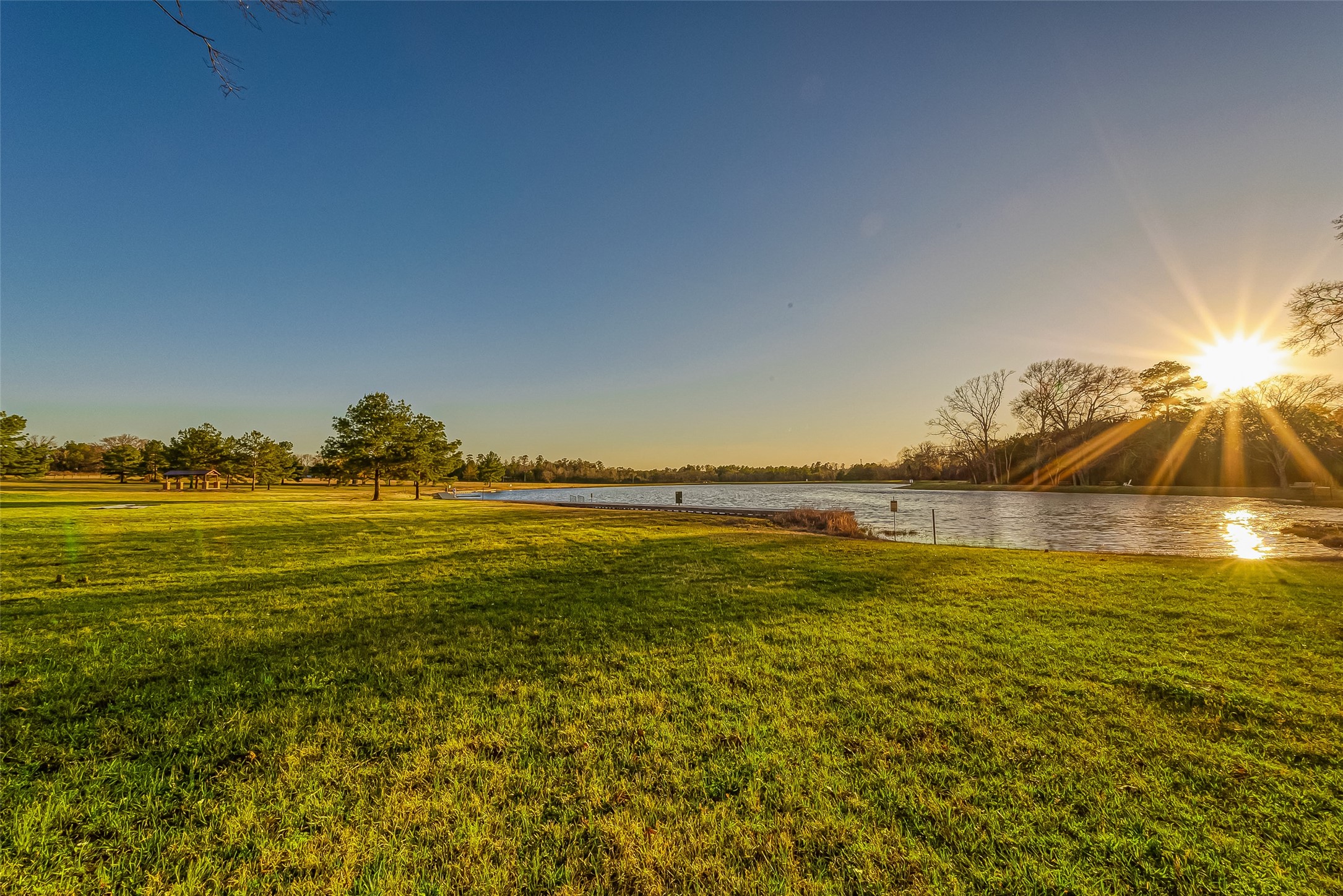 10915 Ruger Road Willis, TX 77378 - Photo 50 of 50 Experience breathtaking sunsets over serene waters at RGR, your perfect retreat.