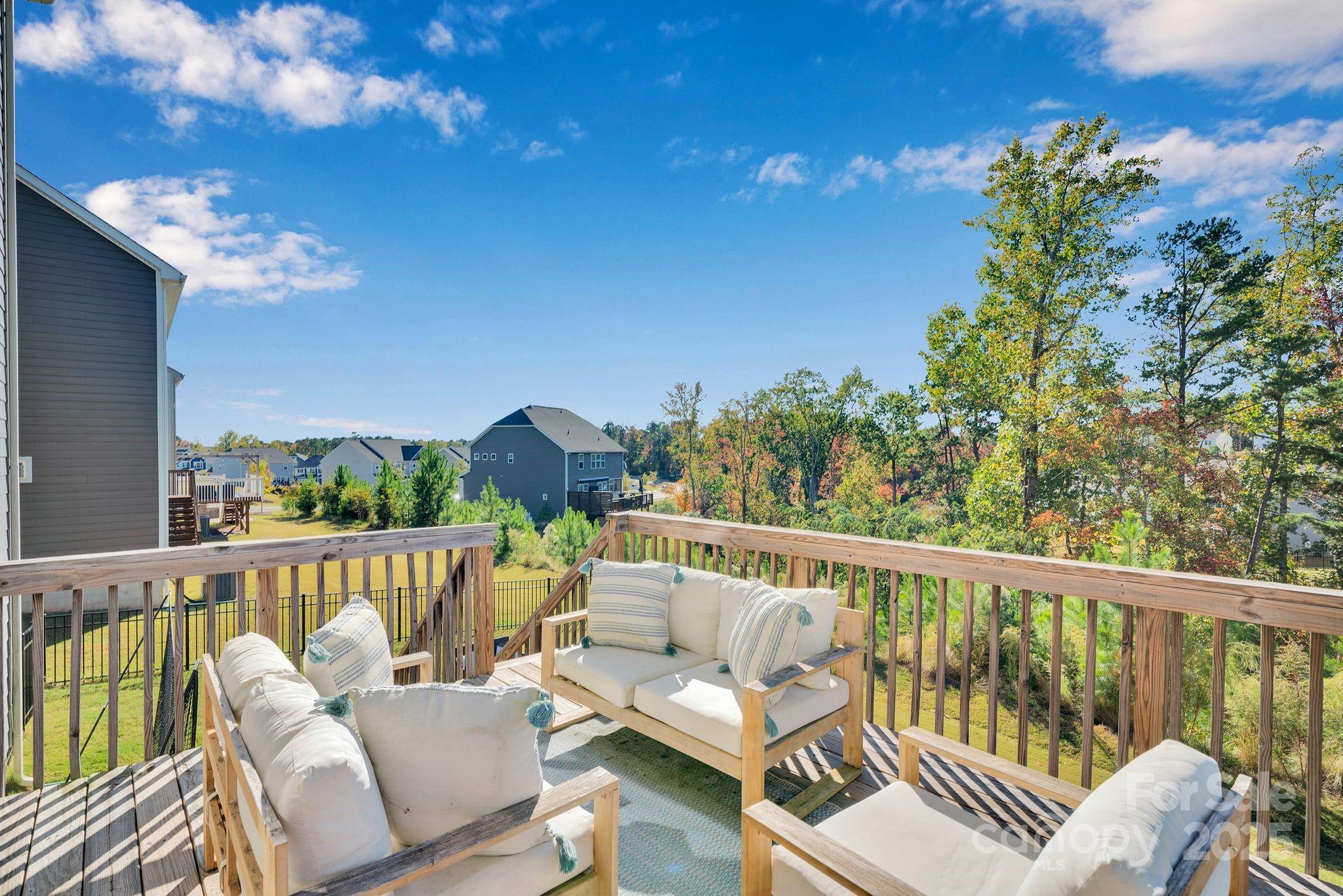17112 Snug Harbor Road Charlotte, NC 28278 - Photo 40 of 45 a view of a chair in a balcony