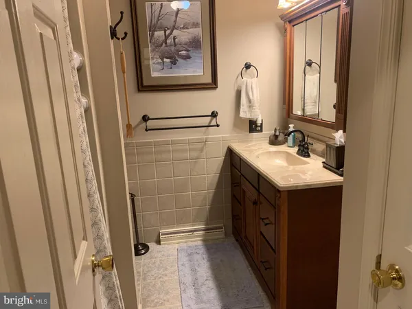a bathroom with a shower and a toilet
