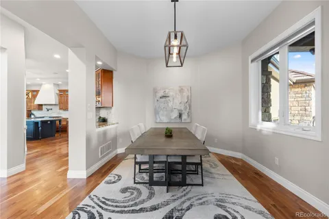 a room with furniture and a wooden floor