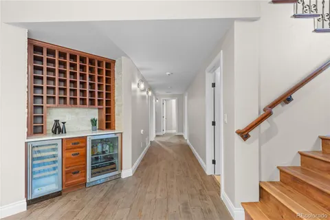 a view of kitchen and wooden floor
