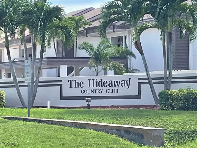 a kitchen with stainless steel appliances granite countertop a sink refrigerator and microwave