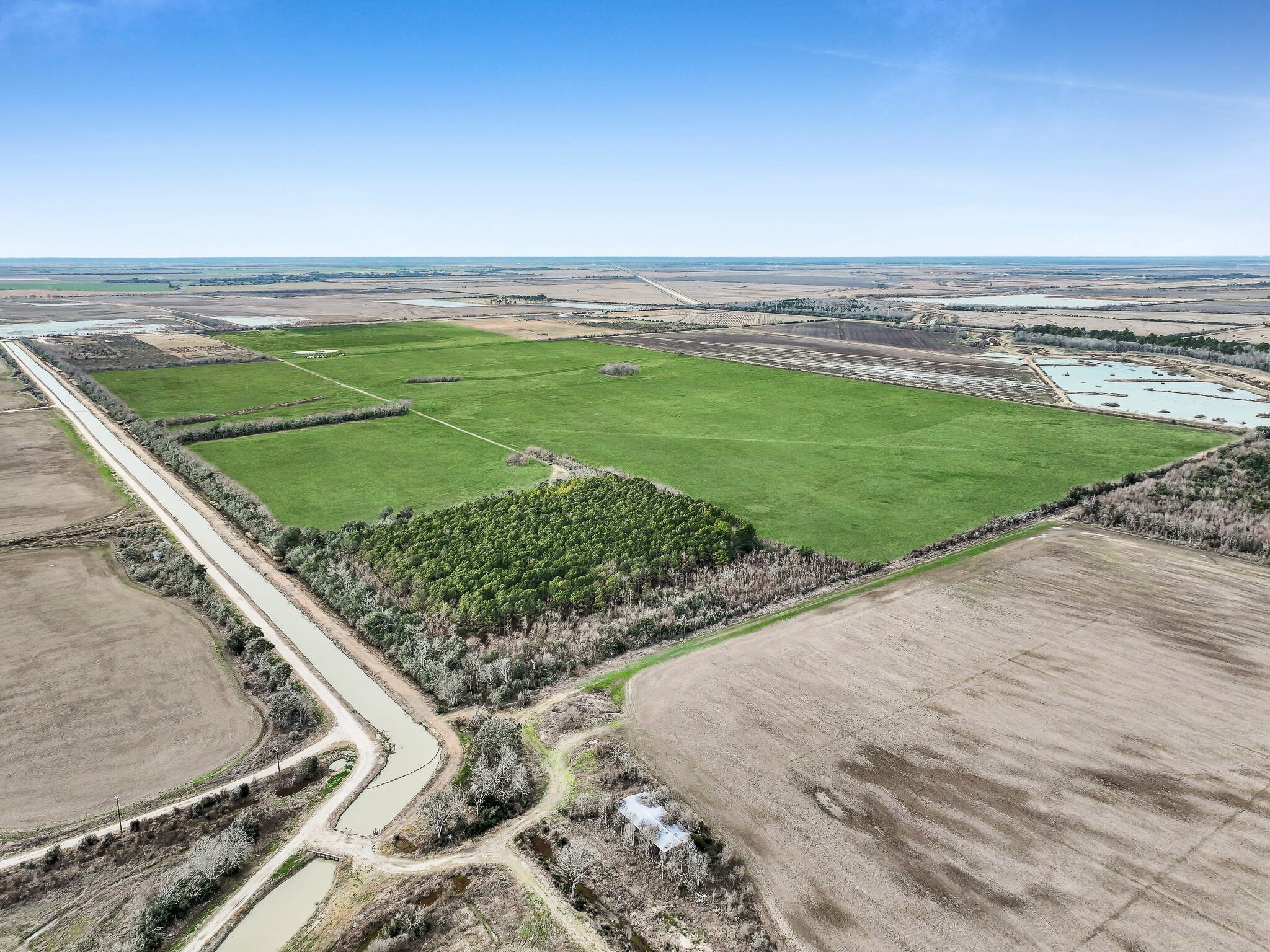 747 Canal Road Winnie, TX 77665 - Photo 13 of 21 a view of a tennis court