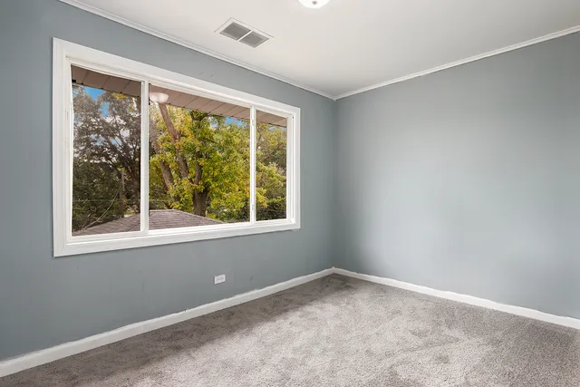 an empty room with a window