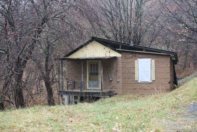 1715 Bear Wallow Road Lansing, NC 28643 - Photo 1 of 1 front view of a house with a yard