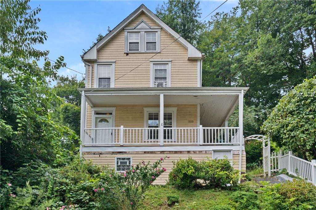 223 Hickory Street McKees Rocks, PA 15136 - Photo 1 of 27 a house view with a garden
