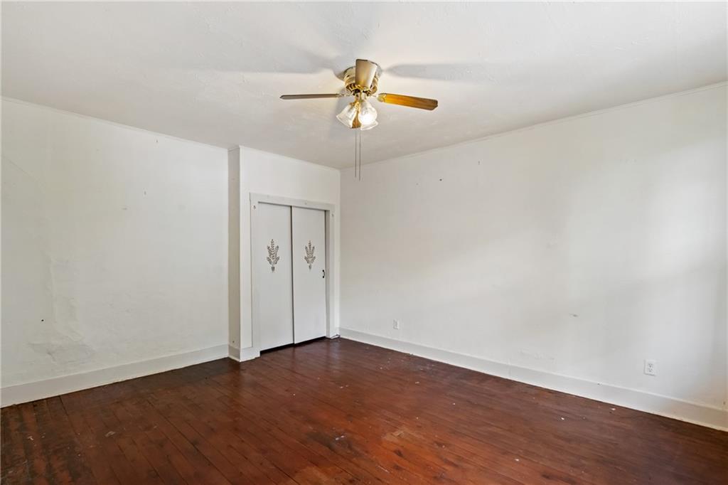 223 Hickory Street McKees Rocks, PA 15136 - Photo 16 of 27 wooden floor in an empty room