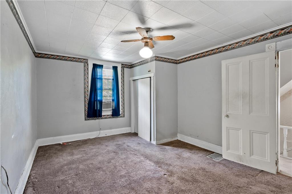 223 Hickory Street McKees Rocks, PA 15136 - Photo 24 of 27 a view of an empty room with a window