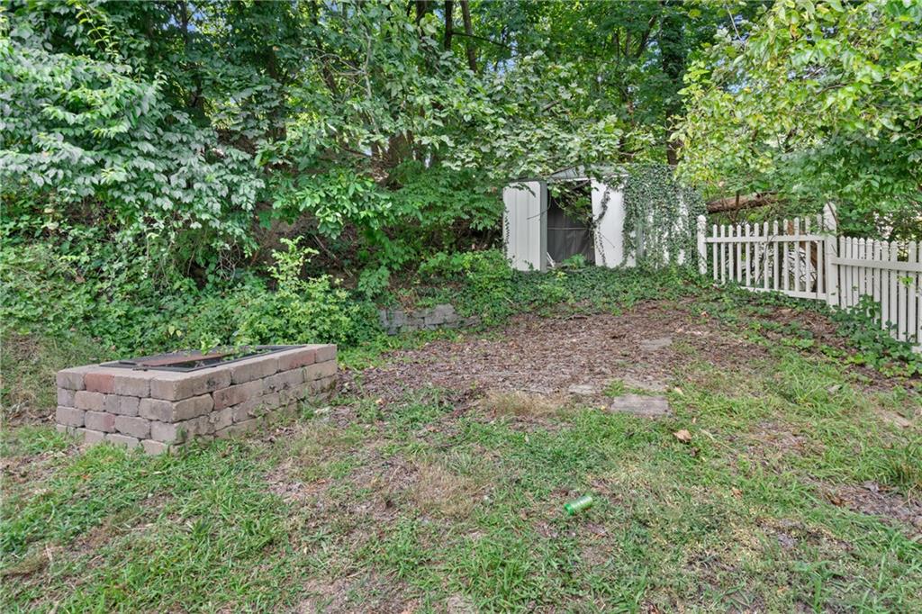 223 Hickory Street McKees Rocks, PA 15136 - Photo 27 of 27 a view of a house with a yard and plants