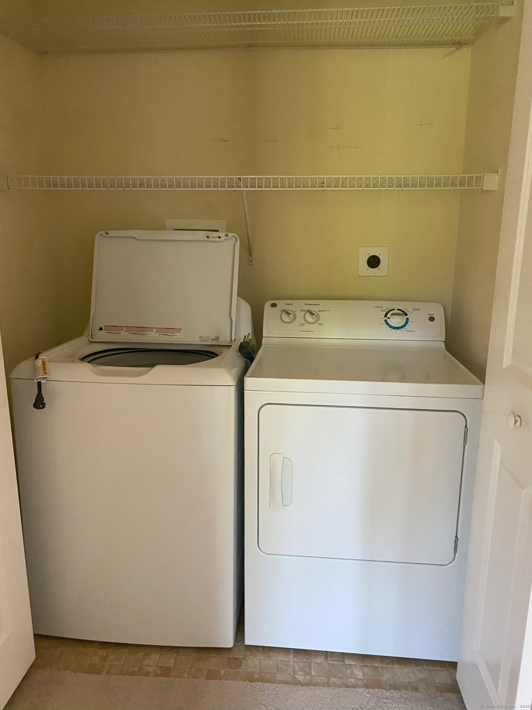 380 Main Street, Unit 3 Wallingford, CT 06492 - Photo 7 of 12 a utility room with dryer and washer
