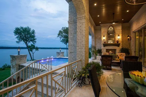 a view of balcony with furniture