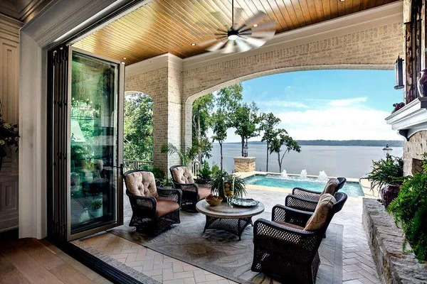 a patio with yard table and chairs