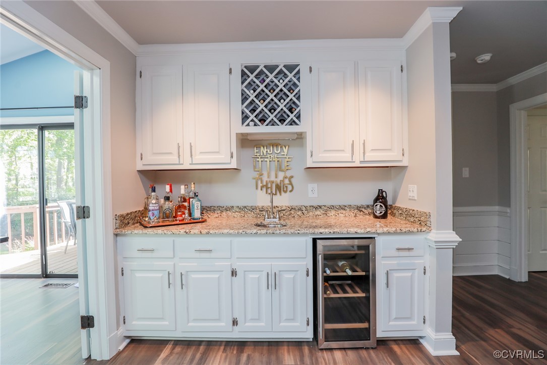12700 Knightcross Road Midlothian, VA 23113 - Photo 10 of 44 Kitchen with wine cooler, white cabinetry, crown m