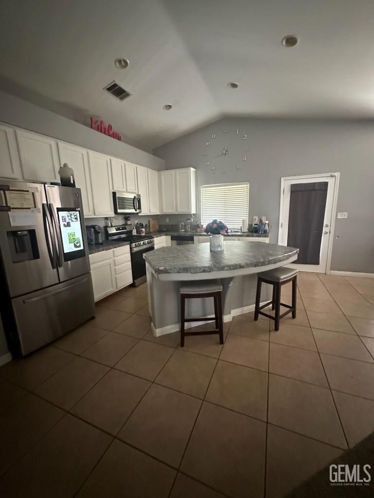 Undisclosed Address Bakersfield, CA 93313 - Photo 3 of 5 a view of kitchen with sink microwave and cabinets
