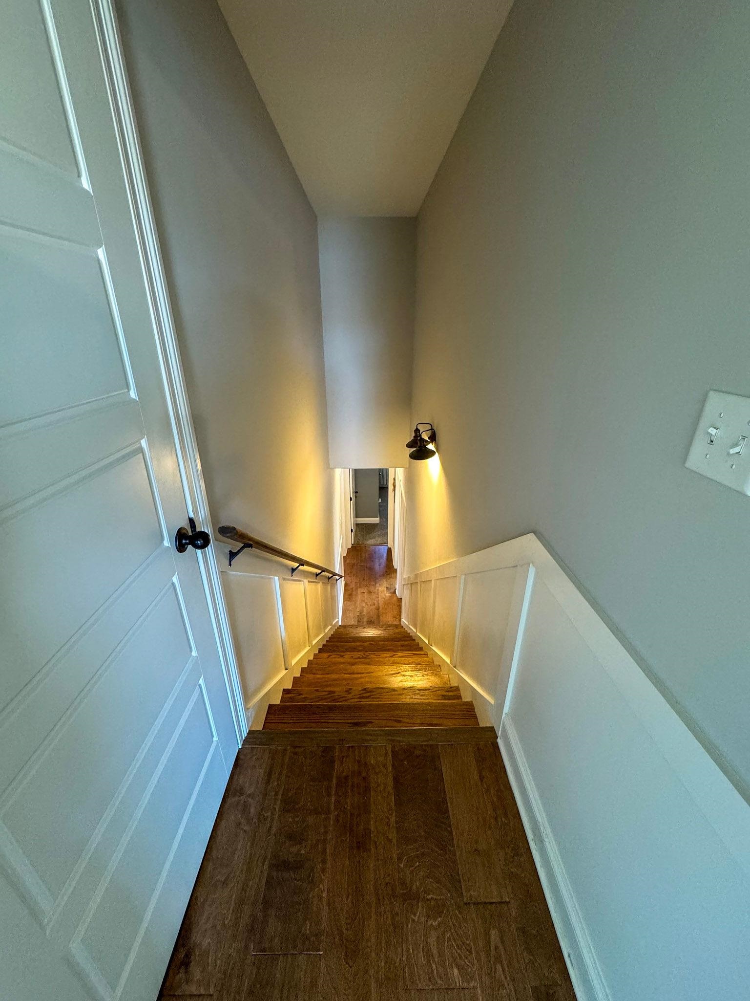 22 Cedar Ridge Cove Atoka, TN 38004 - Photo 17 of 39 Stairs with wood-type flooring