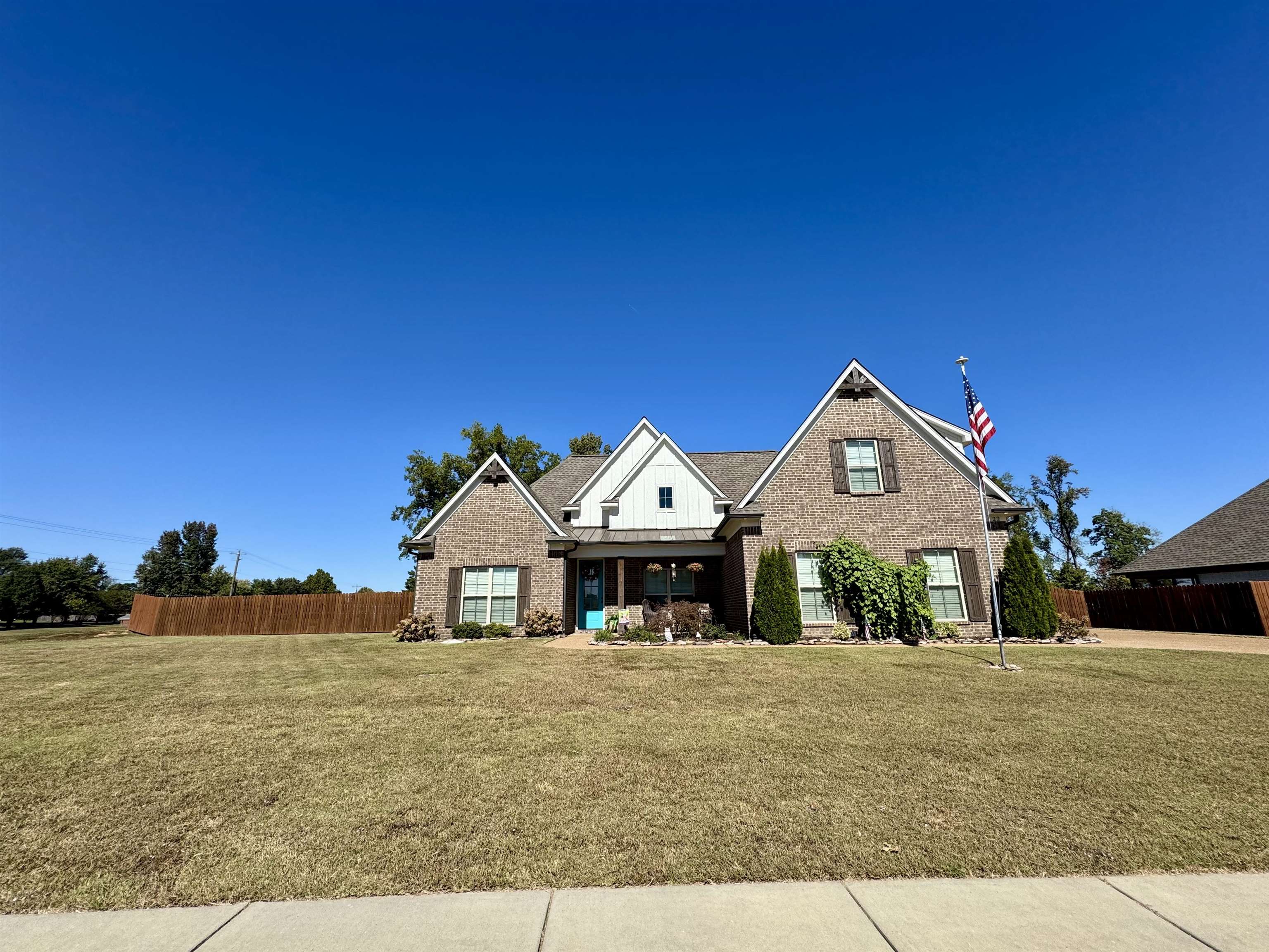 22 Cedar Ridge Cove Atoka, TN 38004 - Photo 2 of 39 View of front facade with a front lawn