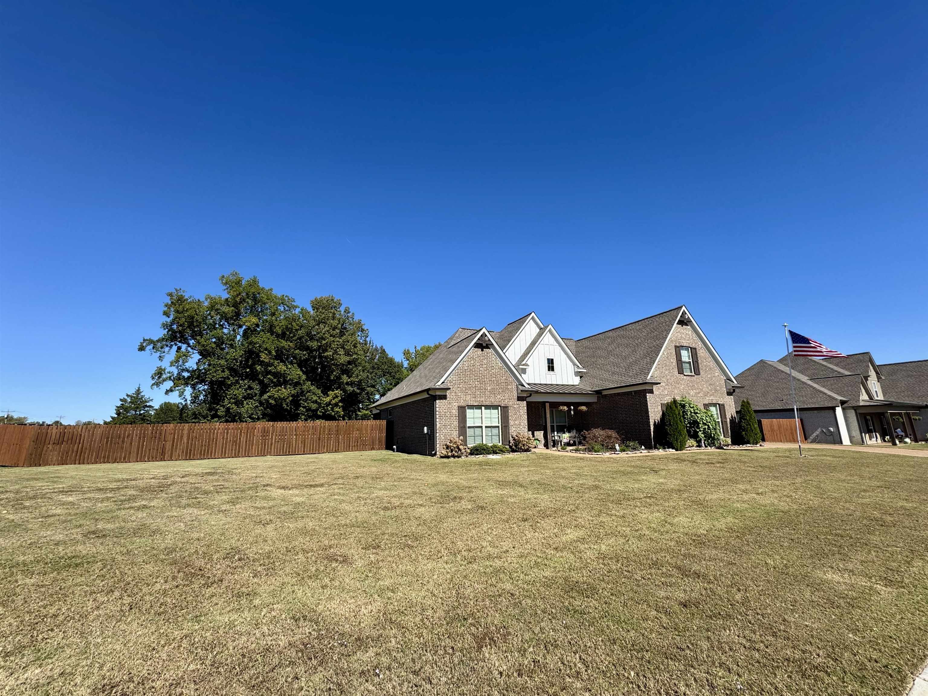 22 Cedar Ridge Cove Atoka, TN 38004 - Photo 3 of 39 View of front facade featuring a front lawn