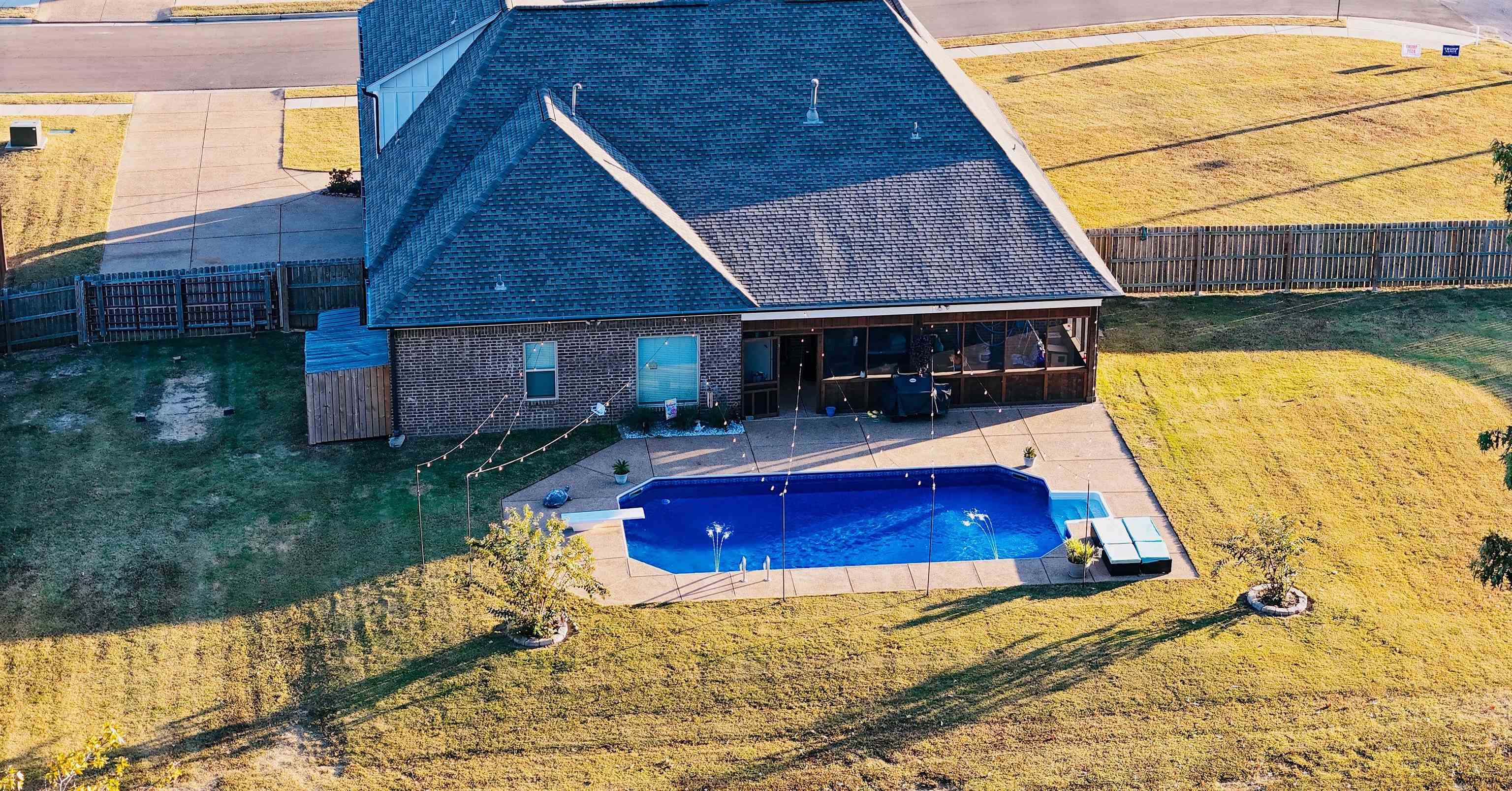 22 Cedar Ridge Cove Atoka, TN 38004 - Photo 31 of 39 View of pool with a yard and a patio area