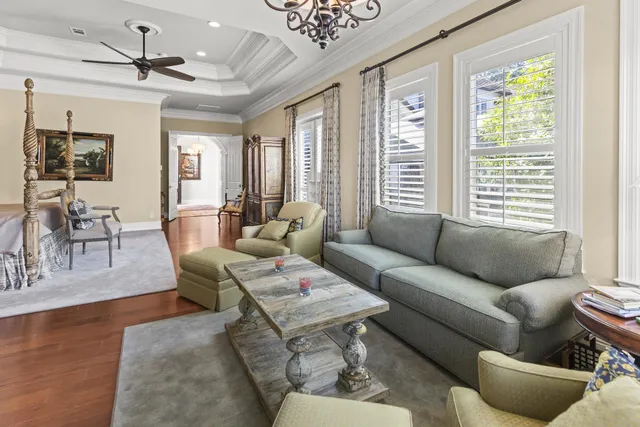 a spacious bathroom with a double vanity sink a mirror and a shower