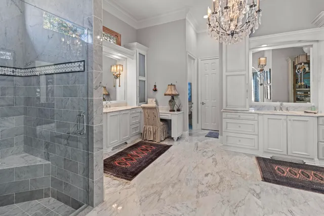 a white toilet sitting next to a bathroom sink