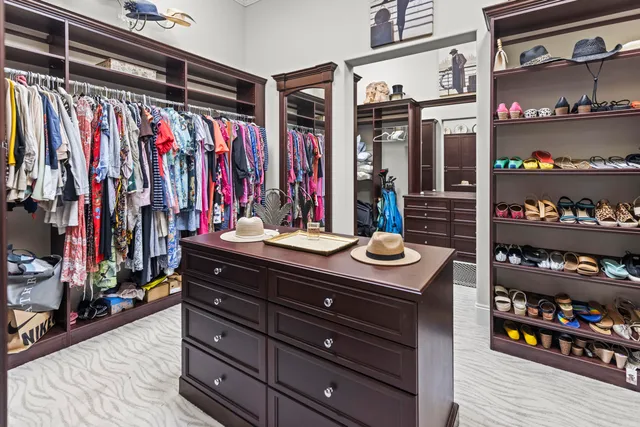 a bed room with a bed and a lamp