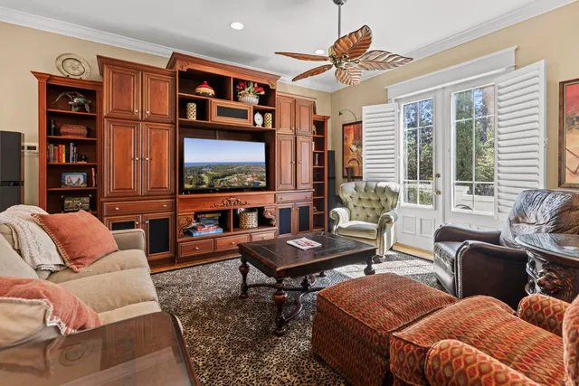 a bathroom with a tub a sink and mirror