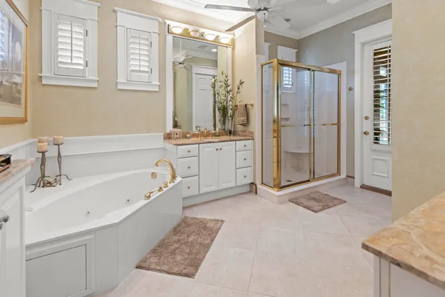 a white toilet sitting next to a bathroom sink