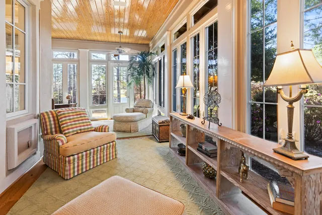 a bathroom with a toilet a sink and a mirror